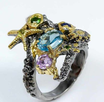 Серебряное кольцо с голубым топазом арт 3993