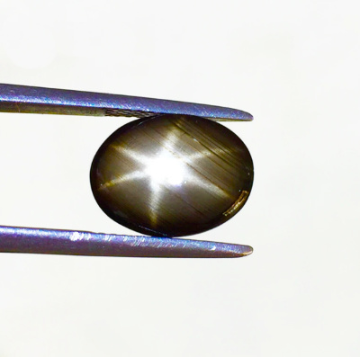 Звездчатый черный сапфир натуральный 1.2 карат 5х7 мм арт 50344