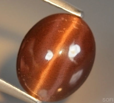   Камень Скаполит натуральный с эффектом кошачьего глаза 3.38 карат арт. 22259