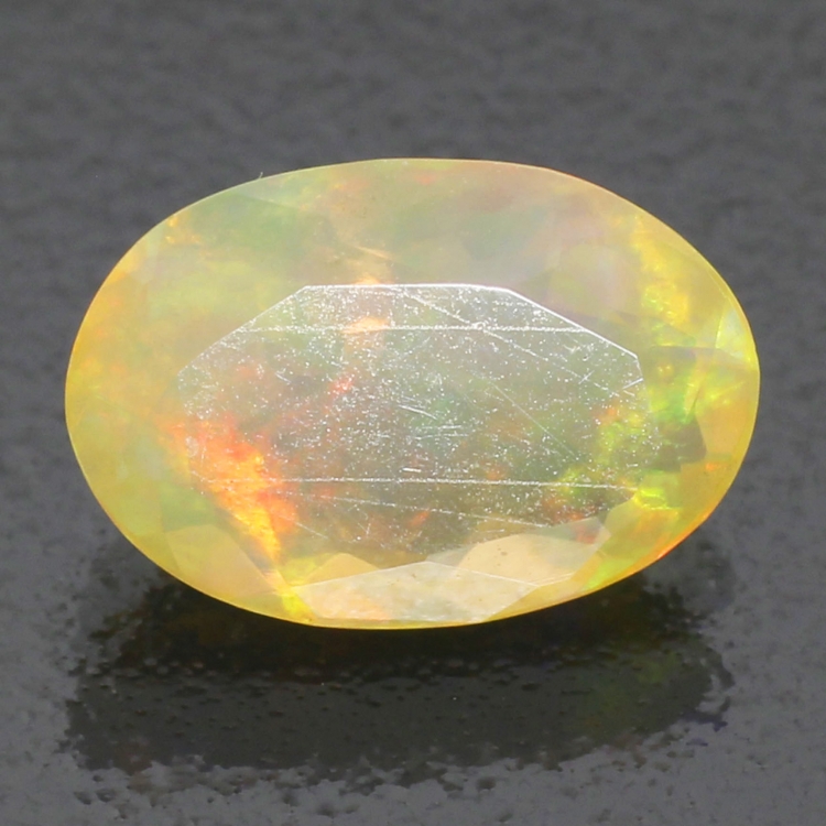  Камень RAINBOW MULTI опал натуральный 0.87 карат арт. 6131