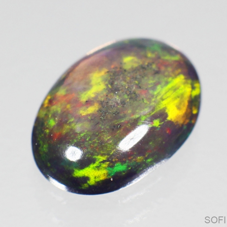  Камень чёрный радужный опал натуральный 1.18 карат арт. 4547-1