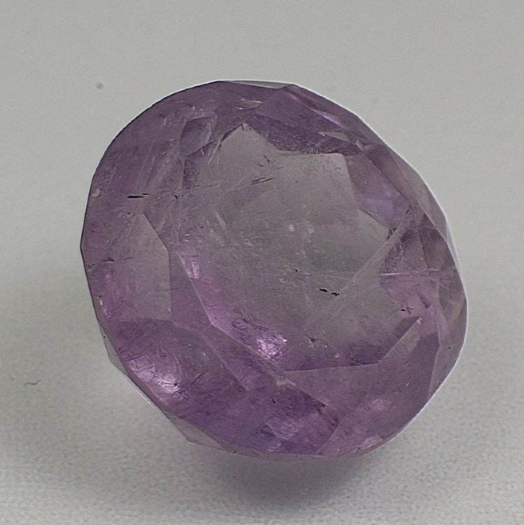 Аметист купить в москве. 003-А аметист камень юнипрайс. Полудрагоценный камень аметист. Аметист камень натуральный. Фиолетовый камень.